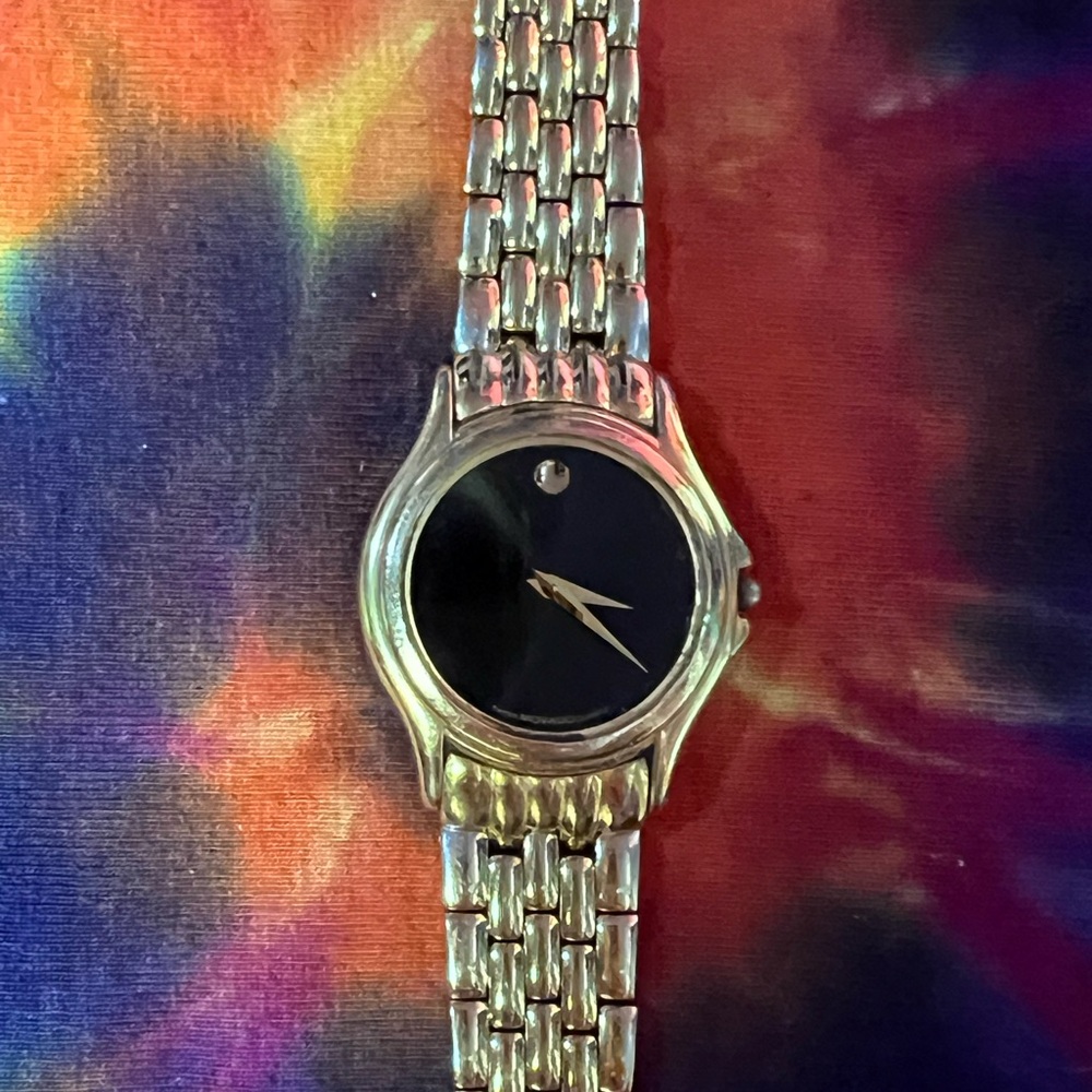 Movado gold  and Black Watch